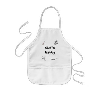 Enfant Chef dans le tablier de formation