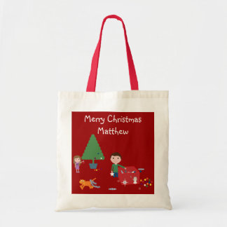 Enfants et sac mignons de cadeau de Noël de chat
