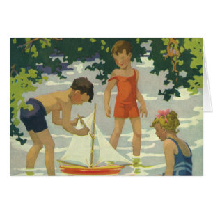 Enfants vintage jouant avec des voiliers jouets su