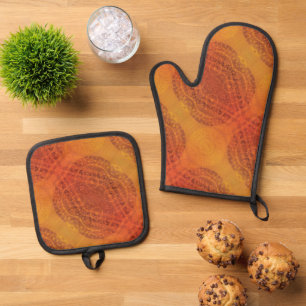 Ensemble De Gant De Cuisine Et De Manique Acceptation Médaillons de saumons rouges orange