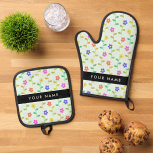 Ensemble De Gant De Cuisine Et De Manique Fleurs colorées, fond vert clair, noir
