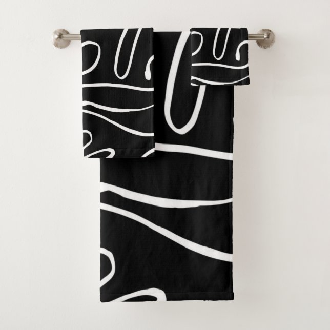 Ensemble de serviettes de bain noir sur blanc (En situation)