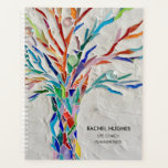Entraîneur de vie Planificateur personnalisé<br><div class="desc">Ce planificateur unique est décoré d'un imprimé d'arbre en mosaïque composé de minuscules morceaux de verre aux couleurs vives. Facilement personnalisable avec votre nom, profession et l'année. Utilisez l'option Personnaliser supplémentaire pour modifier la taille, le style ou la couleur du texte si vous le souhaitez. Parce que nous créons notre...</div>