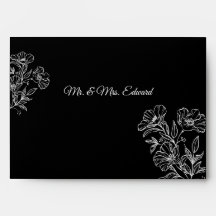 Enveloppe noire avec illustrations botaniques en l