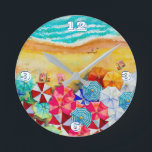 Été Plage Parapluies Horloge Ronde<br><div class="desc">Vagues sur une plage de sable, bains de soleil sous des parasols colorés, cette horloge est un ajout amusant à votre maison de plage ou décor d'été ou offrir en cadeau. CORRESPONDRE des articles dans notre magasin.</div>