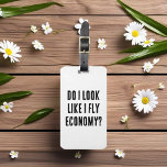 Étiquette À Bagage Ai-Je L'Air D'Avoir Volé Économie Drôle Devis Voya<br><div class="desc">Faites une déclaration audacieuse avec ce drôle de design typographique inspiré du voyage. Avec la phrase "DO I LOOK LIKE I FLY ECONOMY" qui frappe tous les casquettes, il est parfait pour les voyageurs, les coureurs à réaction et toute personne ayant un sentiment d’humour à l’idée de voler avec style....</div>
