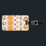 Étiquette À Bagage Amoureux de les chiens mignons d'empreintes de<br><div class="desc">Concevez avec un motif mignon des empreintes de pattes de chien dans des couleurs oranges et jaunes et chaudes. Cette conception regarde comme s'un chien a marché au-dessus du produit ! Pour des amoureux de les chiens partout.</div>