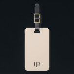 Étiquette À Bagage Bagage à personnaliser avec des initiales Minimali<br><div class="desc">Voyagez avec style grâce à cette étiquette de bagage personnalisée avec monogramme, dotée d'un fond beige amande épuré, d'une sangle noire et d'initiales personnalisées modernes. Le design minimaliste la rend parfaite pour les valises, les bagages à main, les sacs à dos, les sacs de voyage d'affaires, les bagages de lune...</div>