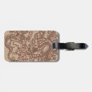 Étiquette À Bagage Dragon de cuivre sur la texture en cuir de Shell
