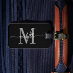 Étiquette À Bagage Élégant Style Noir Gris Monogramme Initiale Script<br><div class="desc">Étiquette de bagage personnalisée élégante moderne féminine noir et gris avec monogramme et nom initial en écriture script. Ce design présente un prénom dans une jolie calligraphie (ou typographie) à queue avec monogramme initial, informations d'adresse en gris et blanc sur fond noir. Celles-ci sont faciles à personnaliser. Cadeau élégant et...</div>