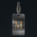 Étiquette À Bagage Élégante écriture initiale monogramme or métal noi<br><div class="desc">Étiquette de bagage personnalisée élégante moderne féminine en métal noir et or avec monogramme et nom personnalisé. Ce design présente un prénom dans une jolie calligraphie à queue avec monogramme initial, nom complet, informations d'adresse en or sur fond de feuille métallique noire. Celles-ci sont faciles à personnaliser. Cadeau élégant et...</div>