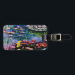 Étiquette À Bagage Étiquette pourpre de bagage de nénuphars de Monet<br><div class="desc">Étiquette pourpre de bagage de nénuphars de Monet. Peinture à l'huile sur la toile de C. 1917. Claude Monet impressionniste français reste renommé et aimé pour les peintures de nénuphar qu'il a créées chez Giverny. Cette peinture de nénuphar de détail comporte un choix divers de couleurs comprenant des rouges ardents,...</div>