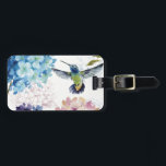 Étiquette À Bagage Fleurs du printemps<br><div class="desc">© Lisa Audit / Wild Apple. L'image présente des fleurs colorées en pleine floraison. Un colibri en vol peut aussi être vu sur l'image.</div>