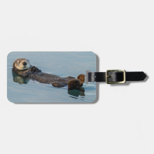 Étiquette À Bagage Loutre de mer flottant sur le dos dans l'océan