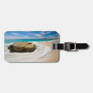 Étiquette À Bagage Marée océanique tourbillonnant sur la plage
