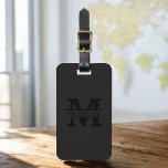 Étiquette À Bagage Monogramme moderne noir minimaliste<br><div class="desc">Améliorez votre expérience de voyage avec notre étiquette de bagages Monogramme minimaliste classique élégant et moderne. Cet accessoire méticuleusement conçu allie élégance intemporelle et minimalisme contemporain, assurant à vos bagages un caractère sophistiqué. Réalisée avec précision et attention au détail, cette étiquette à bagages est plus qu'un simple article pratique, c'est...</div>