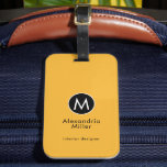Étiquette À Bagage Monogramme typographique moderne minimaliste mouta<br><div class="desc">Un design vertical minimaliste dans un style élégant avec un emblème monogramme noir et blanc avec un gros monogramme typographique initial sur un arrière - plan à la mode jaune moutarde. Le texte peut être facilement customisé à l'aide des champs fournis.</div>
