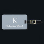 Étiquette À Bagage Monograms Dusty Blue Adventure Attend Don Faveur<br><div class="desc">Initiale monogrammée s avec texte personnalisé "Adventure Await" et aussi des détails personnels comme le nom,  l'adresse,  le numéro de téléphone et l'e-mail que vous pouvez modifier. Conçu avec un arrière - plan bleu poussiéreux populaire,  vous pouvez changer la couleur si vous le souhaitez.</div>