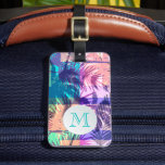 Étiquette À Bagage Palmier monogramme<br><div class="desc">Une étiquette à bagages design présente votre monogramme initial sur un collage de palmiers tropicaux turquoise, bleu, violet, orange et rose à l'avant et vos coordonnées imprimées à l'arrière OU choisissez le style que vous pouvez insérer votre carte de visite à l'arrière. Créez-vous pour vous-même ou offrez-en un cadeau. Sac...</div>