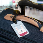 Étiquette À Bagage Winter Rabbit Personalized Bag Tag | Sky<br><div class="desc">This adorable personalized luggage tag makes a great kids stocking stuffer or gift for grandchildren. Cute wintry design features a snowy sky blue background with a cute white rabbit illustration decked out in a pink winter hat and scarf. Personalize with a name or monogram on the front, and add your...</div>