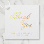 Étiquette-cadeau Mariage Formel Élégant Traditionnel<br><div class="desc">Étiquettes de cadeaux de mariage à la typographie élégante avec un design simple comportant le message "Merci" en calligraphie et vos noms et date ci-dessous. Tous les éléments de design sont en véritable feuille d'or sur fond blanc. Ces étiquettes fantaisie sont idéales pour un mariage formel et ajoutent une touche...</div>