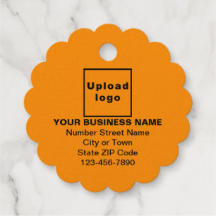 Étiquette-cadeau Marque d'affaires orange de couleur sur fond de pa