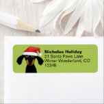 Étiquette Dachshund Santas mignonne Christmas Wiener Dog Adr<br><div class="desc">Apportez des sourires à tous ceux qui figurent sur votre liste ce Noël avec ces étiquettes d'adresse de retour joyeuses qui portent un dachshund noir et bronzé dans un chapeau de Père Noël. Customisez facilement avec votre propre texte. Ce design festif est également présenté sur les cartes de fin de...</div>