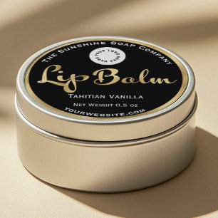 Étiquette de baume à lèvres noir et or avec logo.