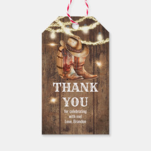 Étiquette de cadeau de fête avec bottes et chapeau