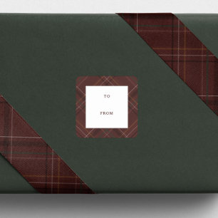 Étiquette de cadeau de Noël à carreaux marron