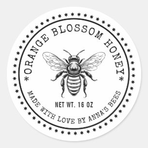Étiquette de miel en fleurs orange avec abeille co