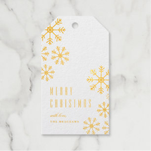 Étiquette de Noël et de fêtes avec flocons de neig