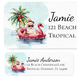 Étiquette Fun Beach Christmas Santa Claus Retour Adresse<br><div class="desc">Ce label d'adresse de retour de Noël côtier présente une aquarelle du Père Noël qui s'allonge dans un flotteur flamand rose avec un palmier dans l'arrière - plan. Parfait pour ajouter une touche de plage amusante à vos mails de vacances</div>