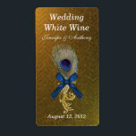 Étiquette Golden Chevron Peacock Feather Mariage Mini vin<br><div class="desc">Des mini-étiquettes mariages chic réalisés dans un motif chevron de couleur or. Des graphiques d'un élégant ton or fleurissent, avec un arc bleu, et une plume de paon, décorent le milieu du étiquette. Le texte en blanc est prêt à être personnalisé pour votre journée spéciale. Idéal pour votre réception de...</div>