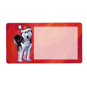 Étiquette Husky à Santa Hat Sur Rouge
