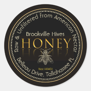 Étiquette local de miel noir et or avec abeille