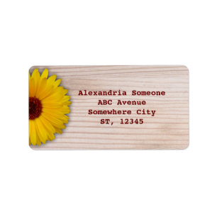 Étiquette Marigold de tournesol sur des planches en bois rus