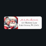 Étiquette Mme Clause Kissing Père Noël Cute Christmas<br><div class="desc">Jolie étiquette d'adresse de retour personnalisée à l'ancienne. Adorable pour les cartes de Noël. Mme Clause embrassant Père Noël sur la joue. Un art mignon qui vous donne cette ambiance nostalgique de Noël.</div>