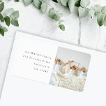 Étiquette Modern Minimal Kids Photo Return Address<br><div class="desc">A stylish holiday photo return address label with classic typography in black on a clean simple white background. The photo and text can be easily customized for a personal touch. A simple, minimalist and contemporary christmas design to stand out this holiday season! The image shown is for illustration purposes only...</div>