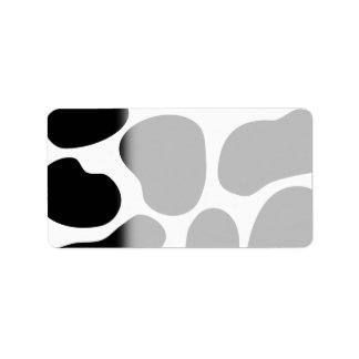 Étiquette Motif d'impression de vache noire et blanche.