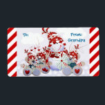 Étiquette Personnalisable Snowman Teddy Bear Tags Christmas<br><div class="desc">Customisez ces étiquettes de Noël pour faire une déclaration spéciale sur les cadeaux que vous donnez à des proches ce Noël. Ils ont un arrière - plan rayé en sucre de canne rouge et blanc et une scène hivernale montrant un mignon bonhomme de neige en casquette d'hiver chaud et foulard...</div>