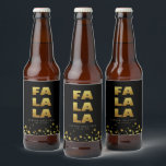 Étiquette Pour Bouteilles De Bière Fa La La | Fun Christmas Black & Gold Beer Bottle<br><div class="desc">Étiquette simple bouteille de bière noir & or de Noël avec le texte "Fa La" dans un style de typographie amusant mais élégant et étoiles pétillantes. Customisez avec un bref message d'accueil et le nom de l'expéditeur. Mélanger et correspondre avec d'autres modèles de cette série.</div>