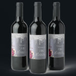 Étiquette Pour Bouteilles De Vin 70th birthday party silver glitter drips floral<br><div class="desc">A label for a 70th birthday party. A dark faux silver metallic looking background. Decorated with dark purple and burgundy and rose pink flowers,  faux silver glitter dripping,  paint drip look. Templates for a name. The text: 70th Birthday is written with a large modern hand lettered style script.</div>