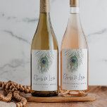 Étiquette Pour Bouteilles De Vin Aquarelle Peacock Fête des mariées en plume Favori<br><div class="desc">Nos étiquettes de vin Peacock Aquarelle Peacock disposent d'une seule plume paon dans des aquarelles douces,  dérigeant du haut,  avec votre texte personnalisé ci-dessous pour coordonner les lettres indigo et bleu nuit — "Cheers to Love" en écriture manuscrite,  le nom de l'événement,  et la date.</div>