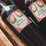 Étiquette Pour Bouteilles De Vin Elf Legs Noël<br><div class="desc">Des jambes d'elfes amusantes portant des collants rayés rouges et ivoire et des bottes vertes avec des cloches de jingle, et vos voeux de Noël de vacances en lettrage chic. Personnalisez ces étiquettes de bouteilles de vin pour servir à votre fête de vacances ou pour donner comme cadeaux ou faveurs...</div>
