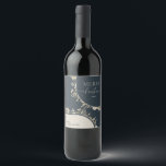 Étiquette Pour Bouteilles De Vin Gold Floral Wreath Blue Christmas<br><div class="desc">Cet élégant étiquette à vin présente des fleurs vintages d'ivoire doré avec un motif floral magnifiquement fait sur le dos! Comptez dessus pour ajouter cette touche magique spéciale à vos cadeaux !</div>