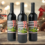 Étiquette Pour Bouteilles De Vin Jambes elfes de Noël Blancs et Noirs<br><div class="desc">Des jambes de elfe botté vert amusant sur un arrière - plan rayé noir et blanc présente votre salutation de Noël de vacances en lettrage chic. Personnalisez ces étiquettes de bouteilles de vin pour servir à votre fête de vacances ou pour donner comme cadeaux ou faveurs de fête pour les...</div>