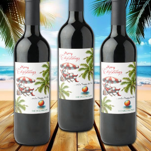 Étiquette Pour Bouteilles De Vin Santa sous un parasol de plage Noël