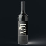 ÉTIQUETTE POUR BOUTEILLES DE VIN TIGES DE JOY WHITE CHRISTMAS POINSETTIA<br><div class="desc">Offrez vos cadeaux avec style avec ce design simple mais beau Tidings of Joy avec un joli poinsettia blanc traditionnel de Noël.</div>