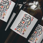 Étiquette Pour Bouteilles De Vin Typographe de Merry Christmas<br><div class="desc">Joyeux Noël dans une police amusante est entouré par de mignons articles de vacances est un étiquette de boisson amusant pour le vin,  vin pétillant,  bouteilles d'alcool,  il est à vous. Des étiquettes parfaits pour offrir un cadeau de vacances ou pour servir à votre fête.</div>